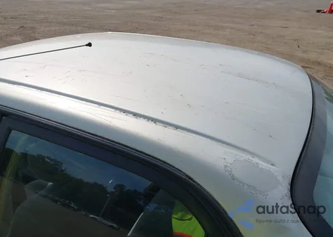 2001 Toyota Corolla Le from USA, damaged, VIN 2T1BR12E41C426052